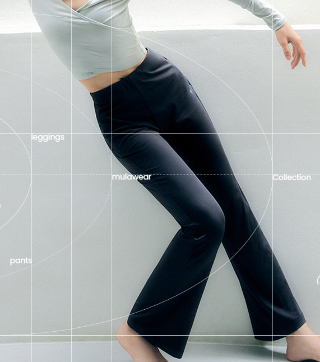 Women in modern activewear walking in a bright studio — neutral tones, minimal and elegant style.